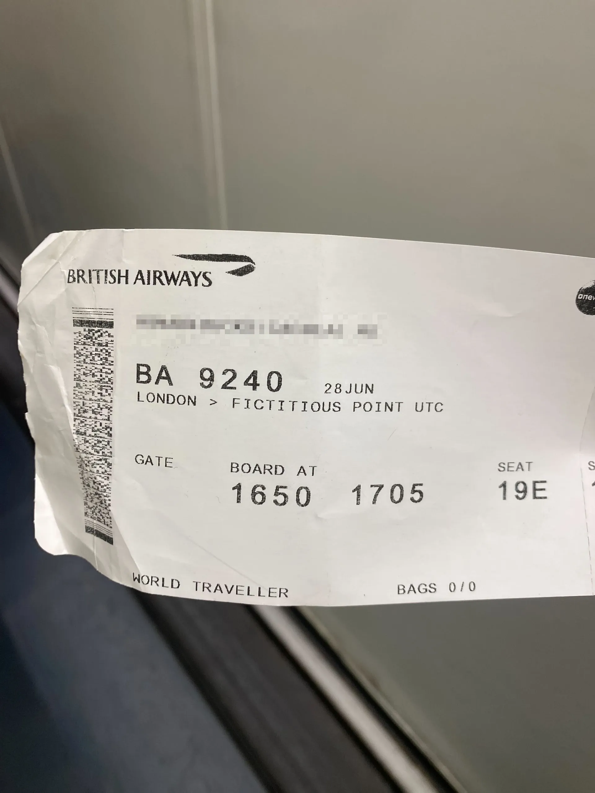 A British Airways boarding pass for a flight from London to an unspecified destination called "Fictitious Point."