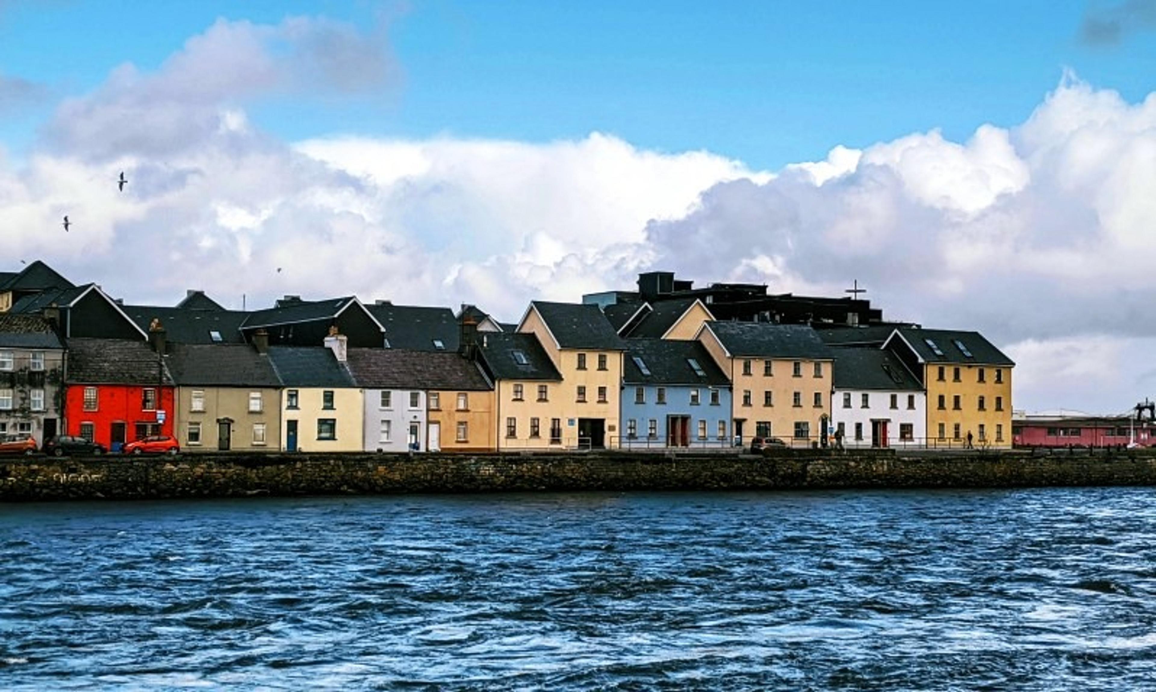 Colourful houses by the water in Galway