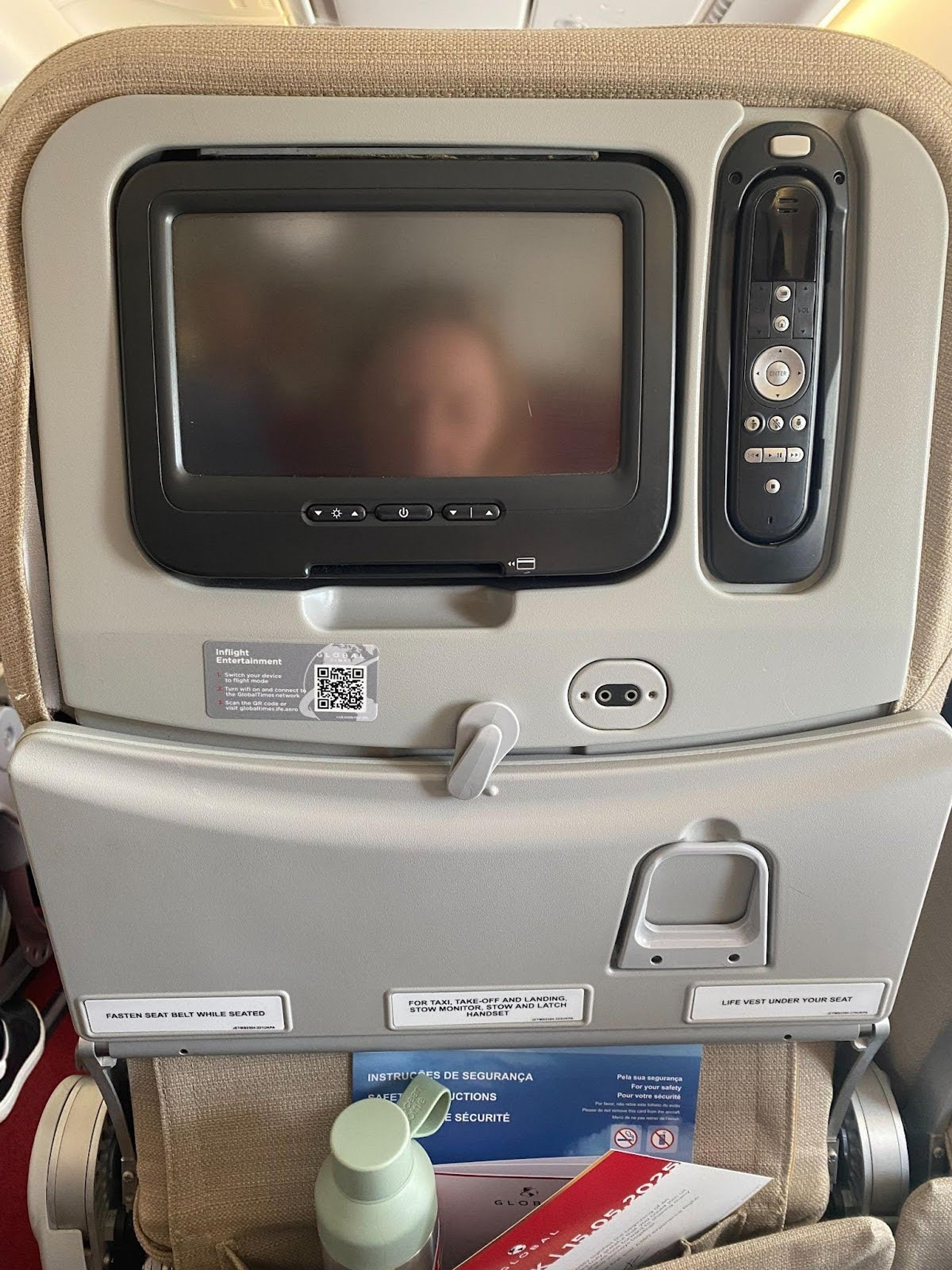 Small, aged seat-back screen and remote control