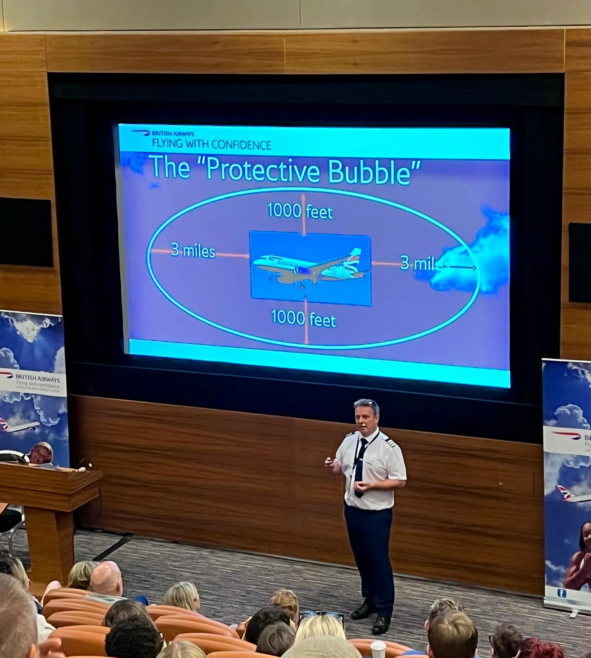 A pilot gives a presentation about the "Protective Bubble" in a seminar at the British Airways headquarters.