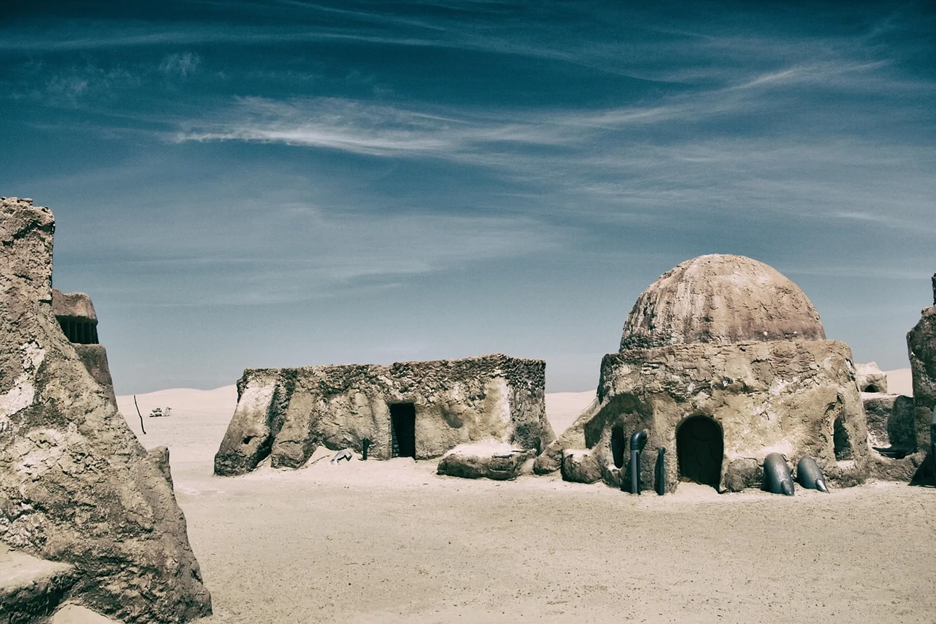 Ancient-looking desert structures evoke the otherworldly scenery of the Star Wars sets in Tunisia.