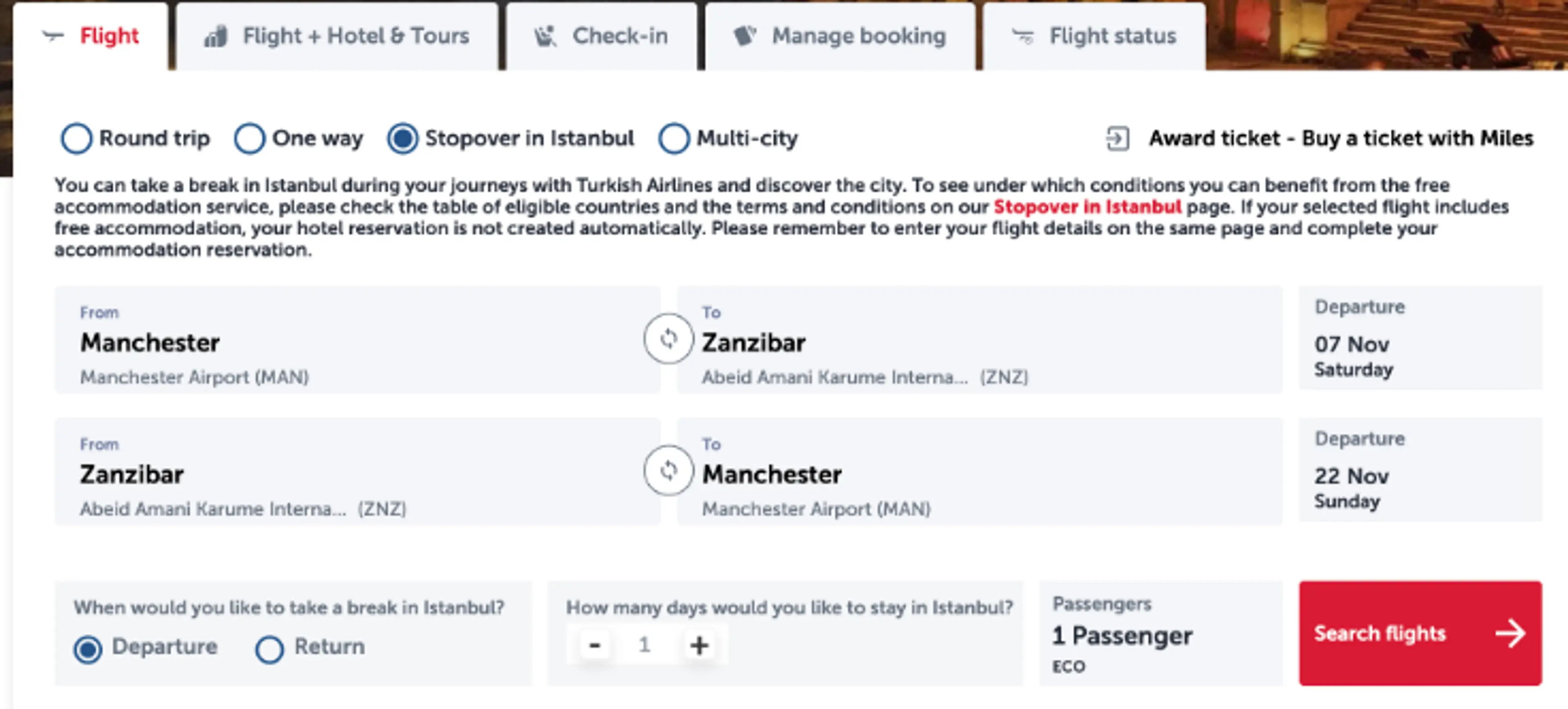 The Turkish Airlines booking page displays a round-trip itinerary between Manchester Airport and Abeid Amani Karume International Airport in Zanzibar, featuring an option for a stopover in Istanbul.
