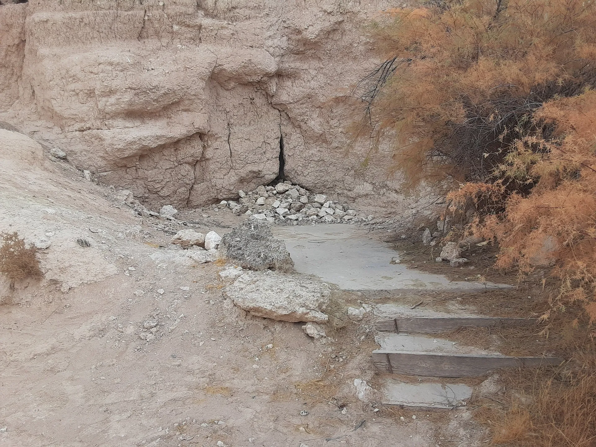 Concrete steps to nowhere, built into a rocky cliff
