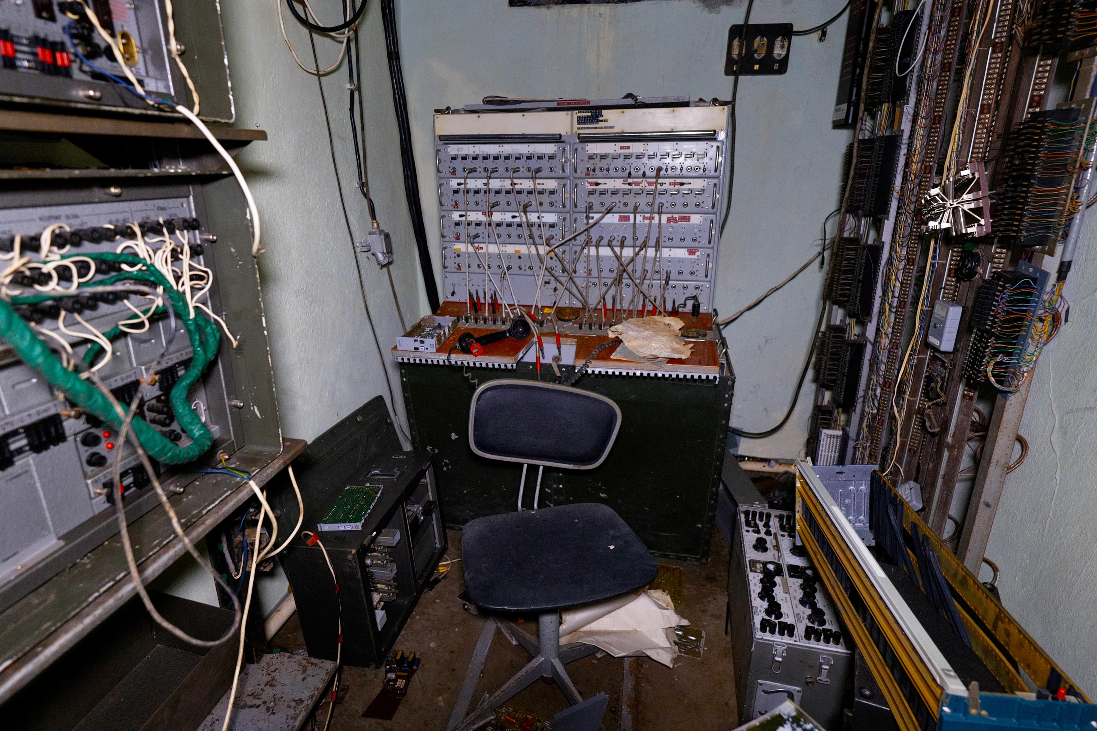A cramped switchboard room in dissary. 