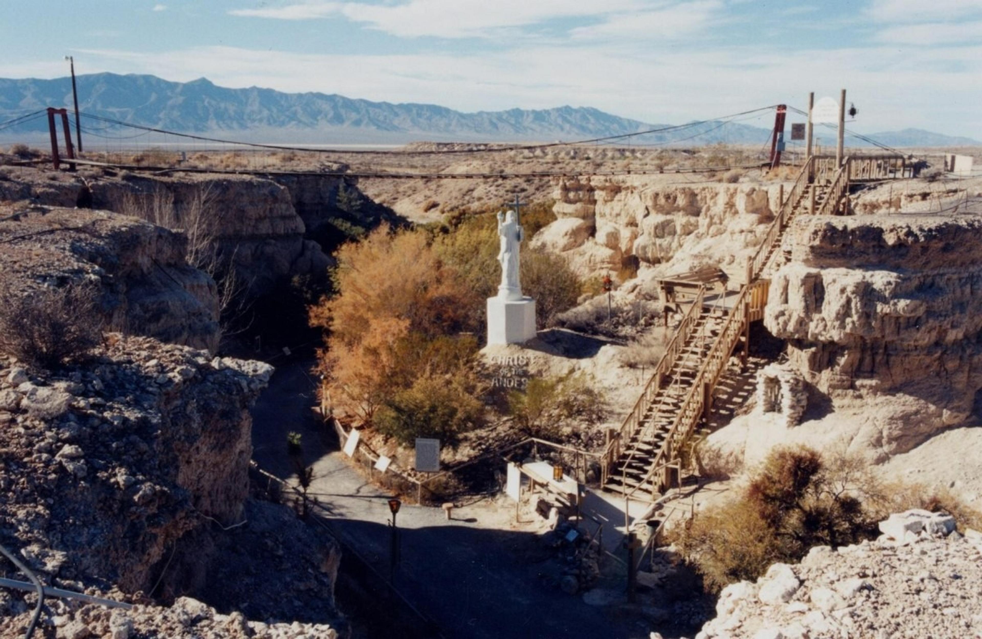 Cathedral Canyon in its heyday with a pristine statue, bridge, and stairs.