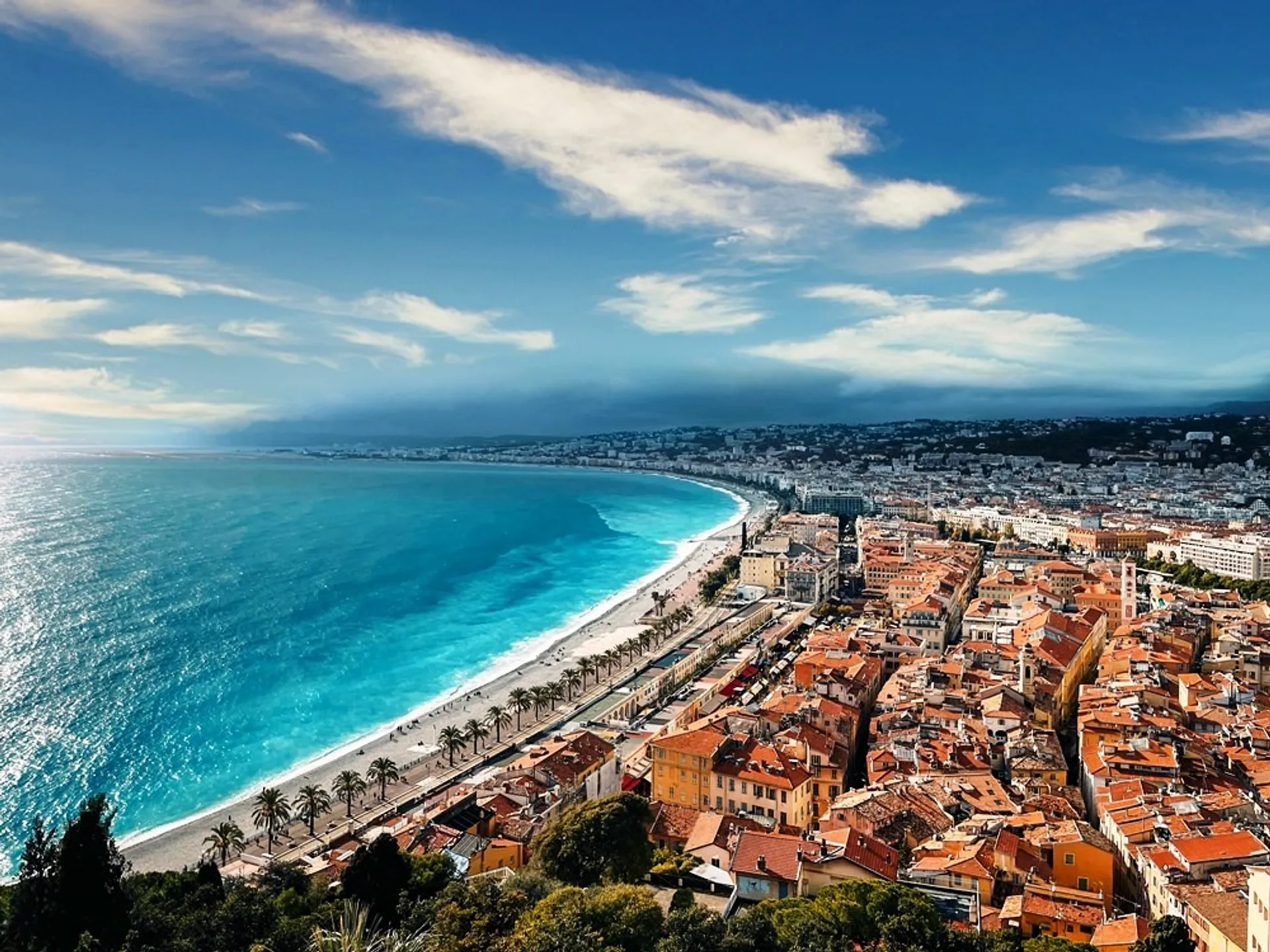 Nice, France, with its iconic Promenade des Anglais curving along the azure coastline.