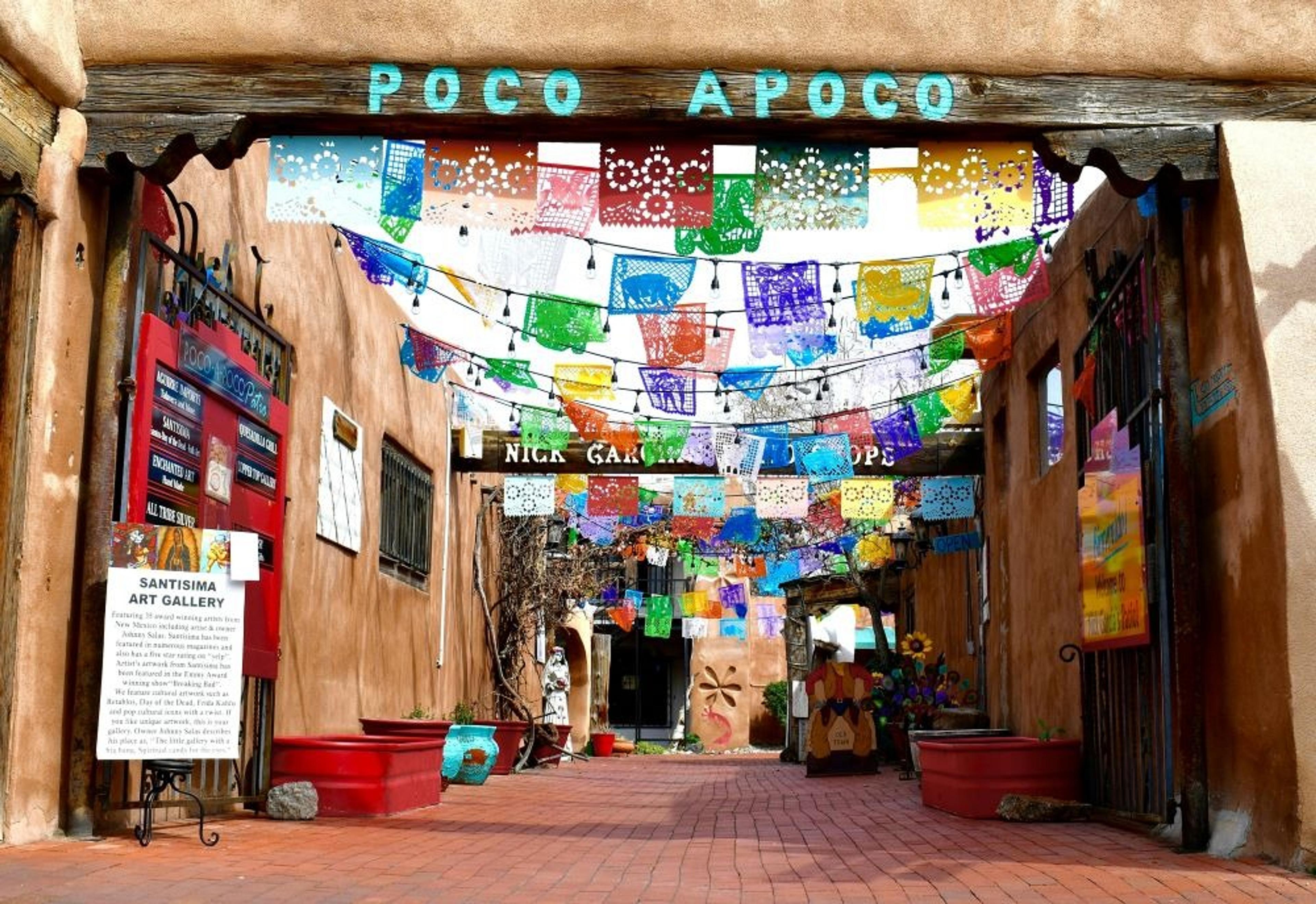 Colourful flags hanging above a walkway