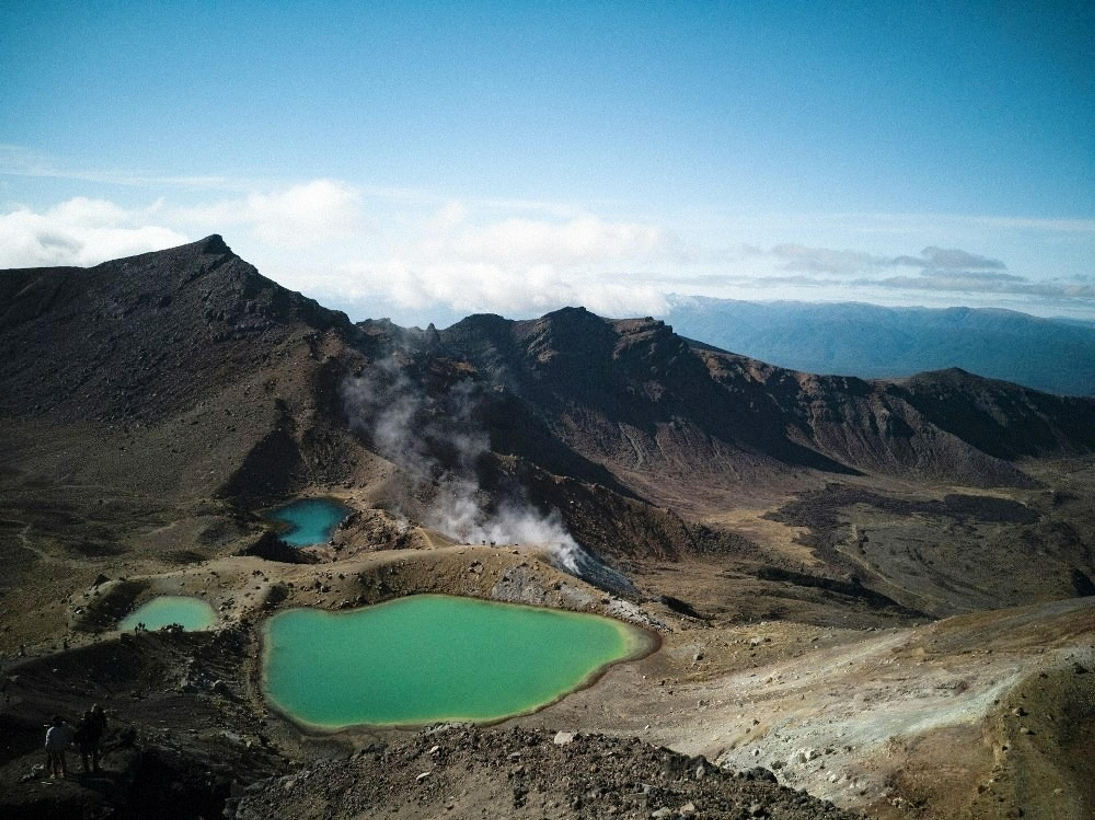Volcanic mountain with green pools
