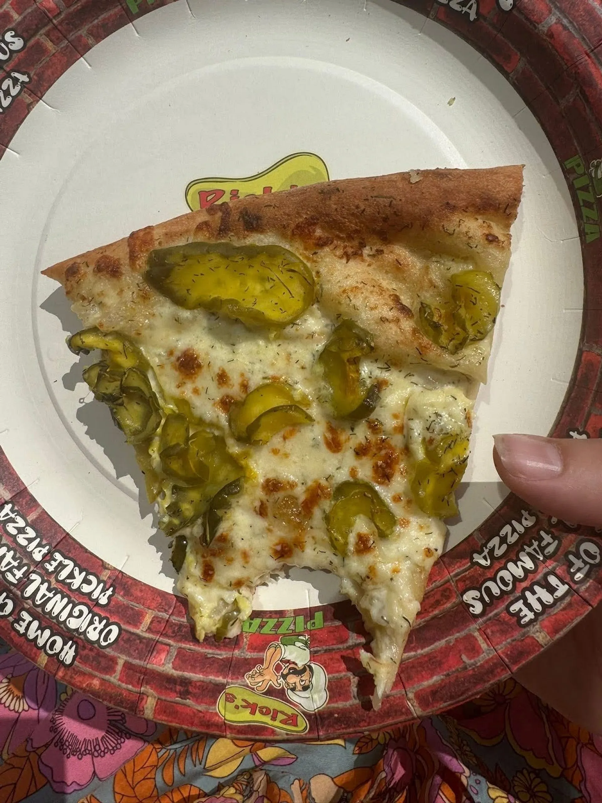Dill pickles on a pizza