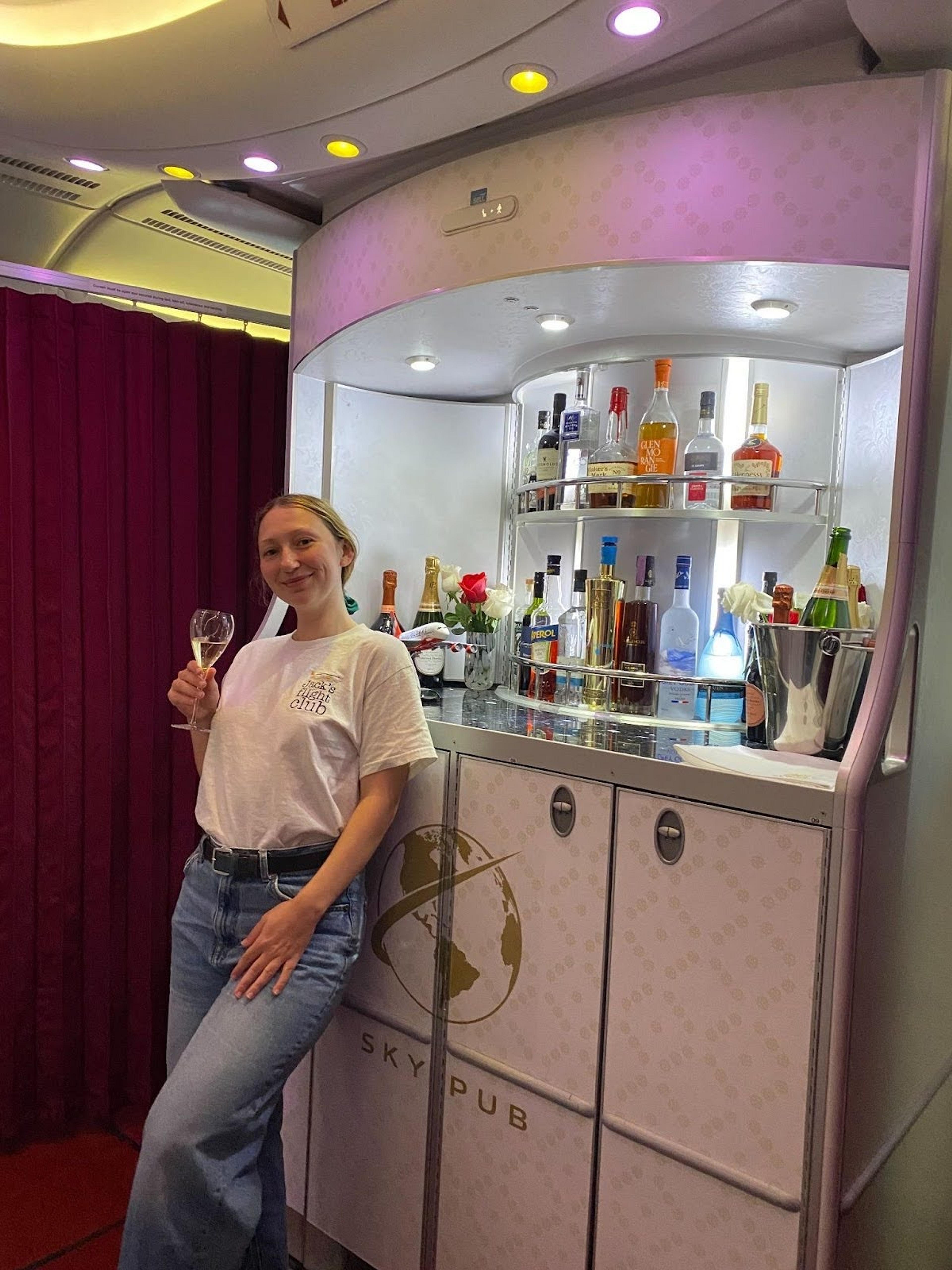 Lauren standing in front of the Global Airlines Sky Pub